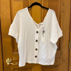 White oversized button down tee